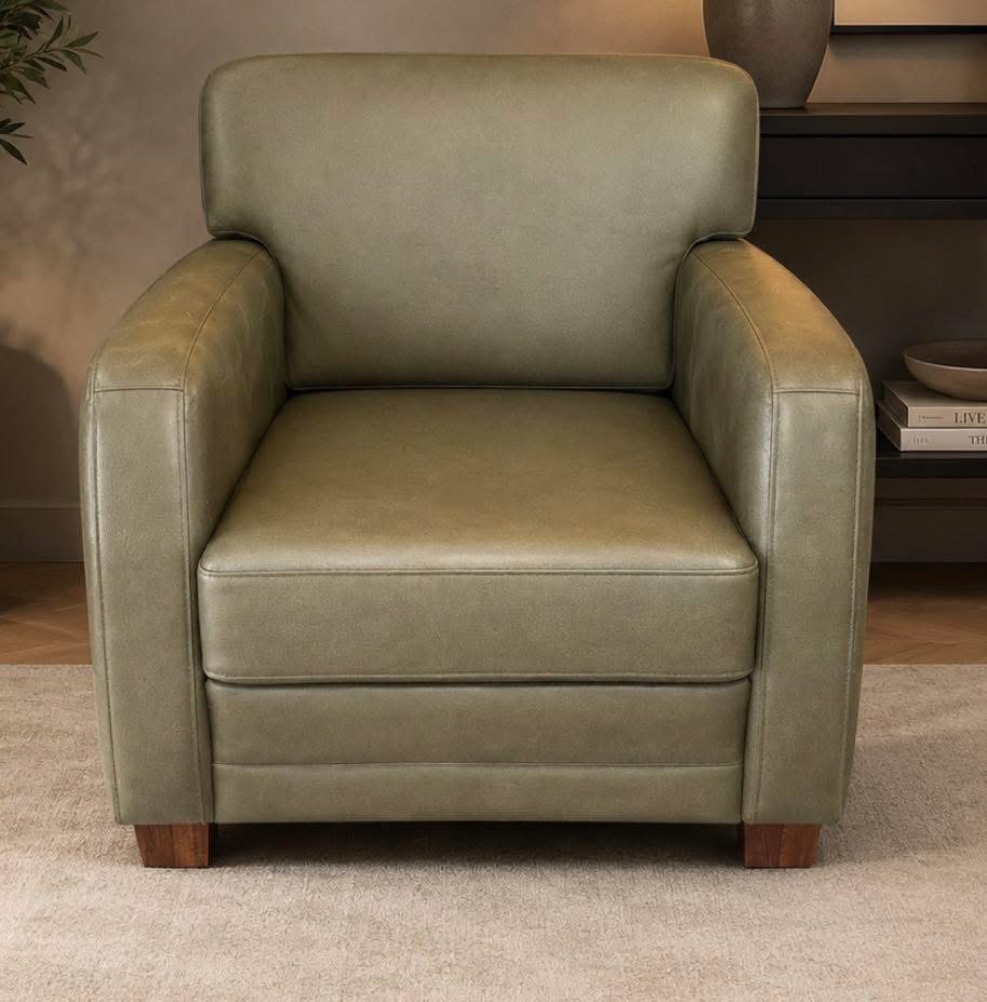 Groene leren fauteuil na kleurherstel